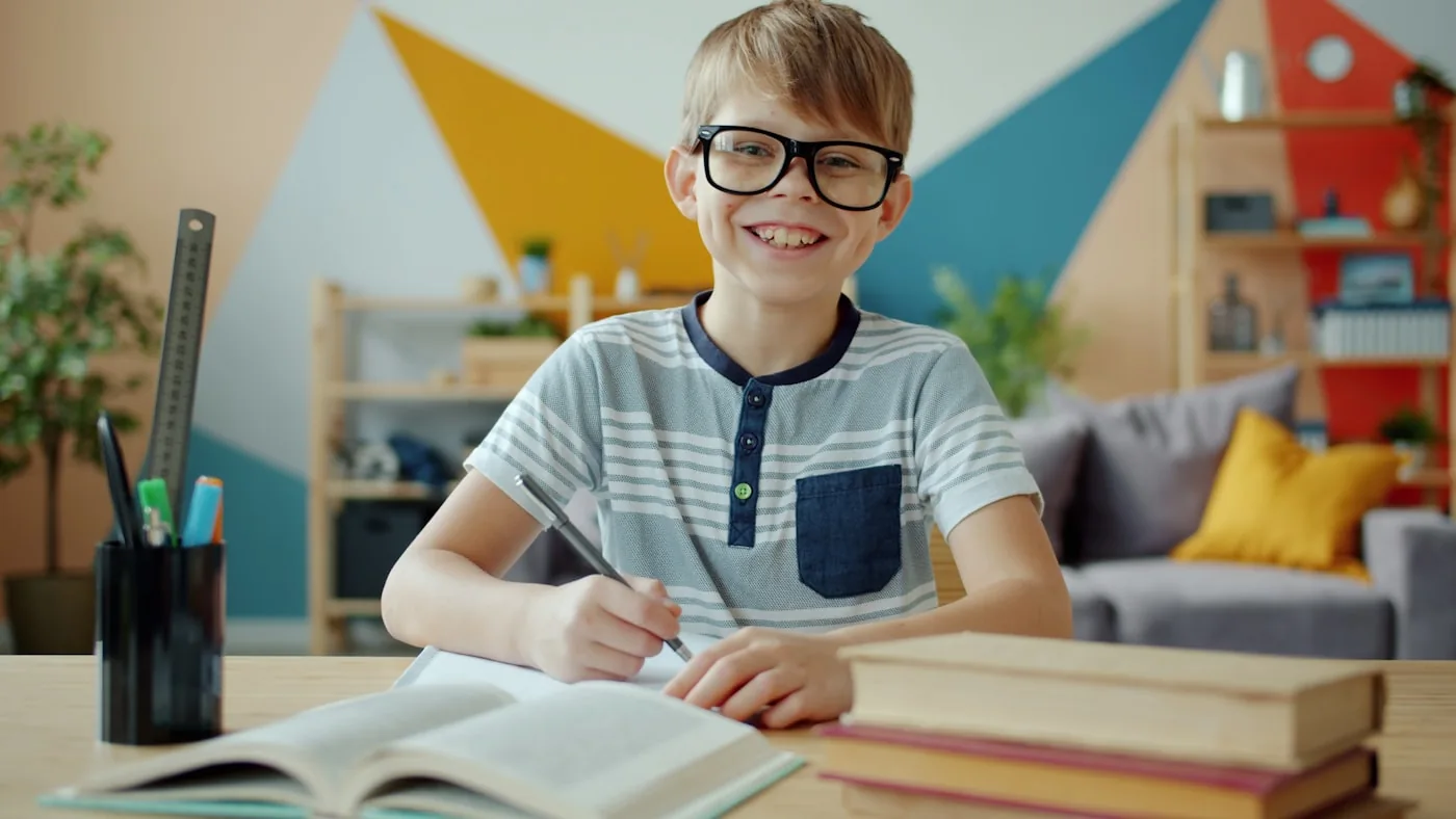 A student focused on a writing lesson