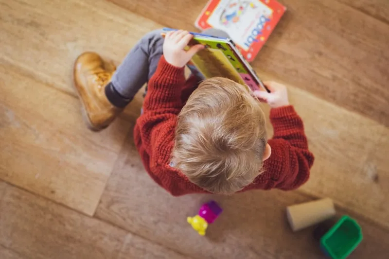 A child absorbed in a book