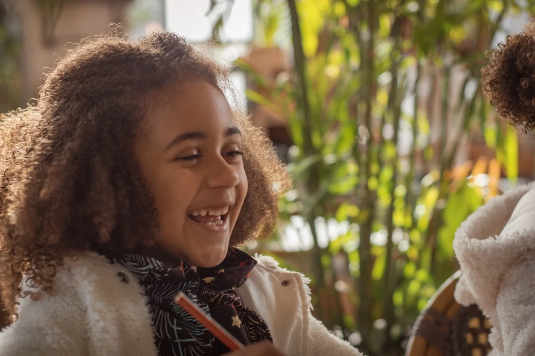 A child laughing with delight
