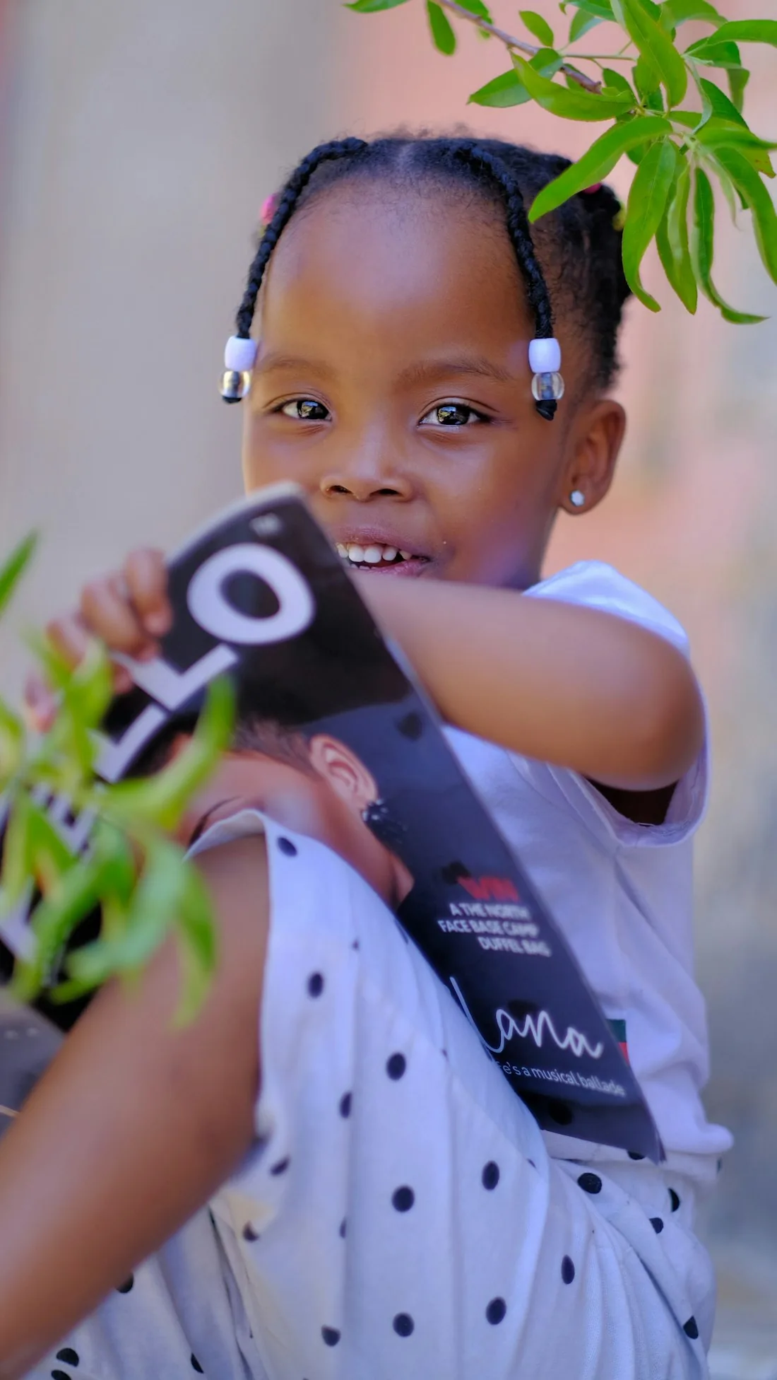 A young child learning letters and words